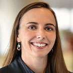 a woman smiling for the camera