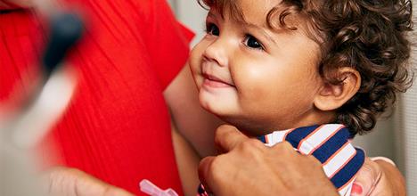 A small child being vaccinated.