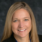 a close-up of a woman smiling