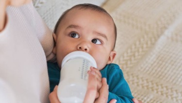 baby bottle dark eyes