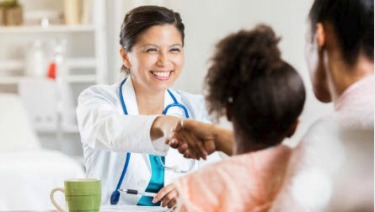 doctor mom shaking hands