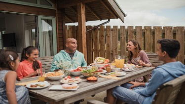 Family having a meal outside