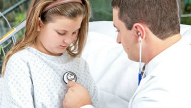 Doctor and girl in emergency room.