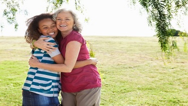 Daughter and mom hugging