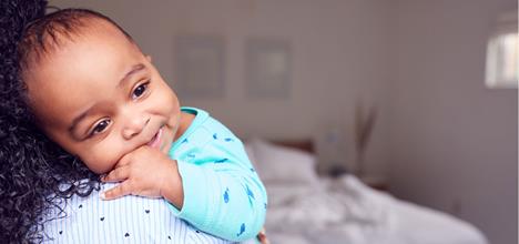 Is it safe to put a bag of rice on a baby’s tummy to help them sleep?