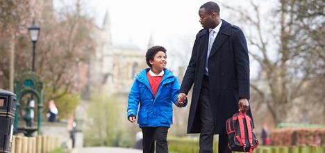 son dad walkiing to school