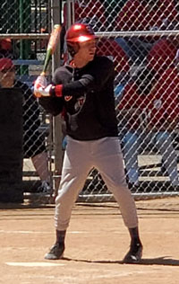a baseball player holding a bat